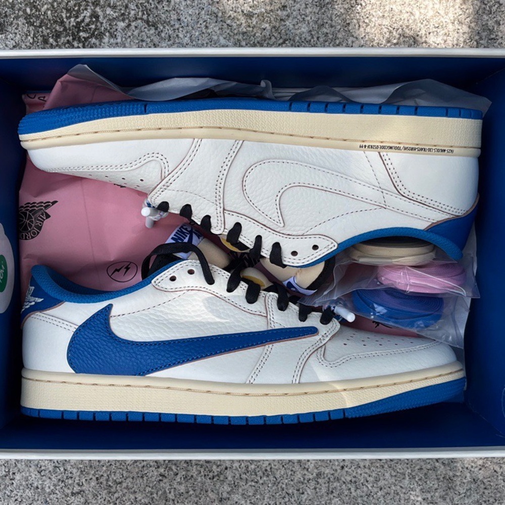 Nike White Leather Low-Top Sneakers with Blue Swoosh